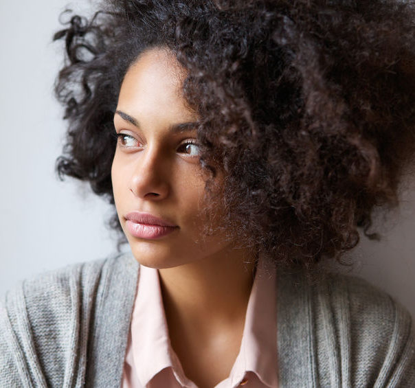 pensive beautiful young Black woman